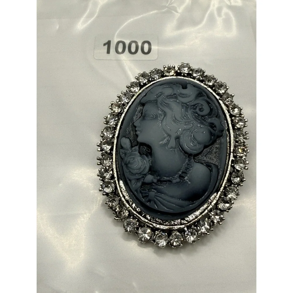 Vintage Cameo Brooch Black Resin Left Facing Silver Tone Rhinestone Surround